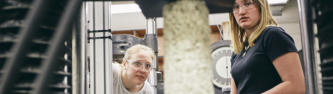 Students observe results in a lab