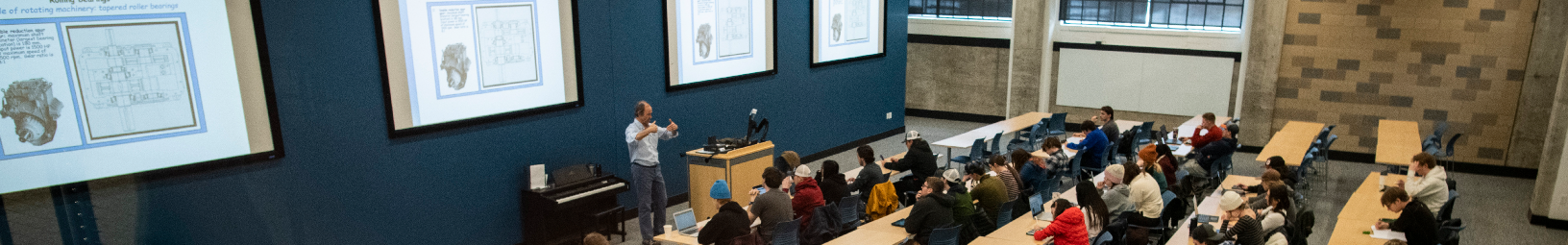 professor lecturing in front of a class