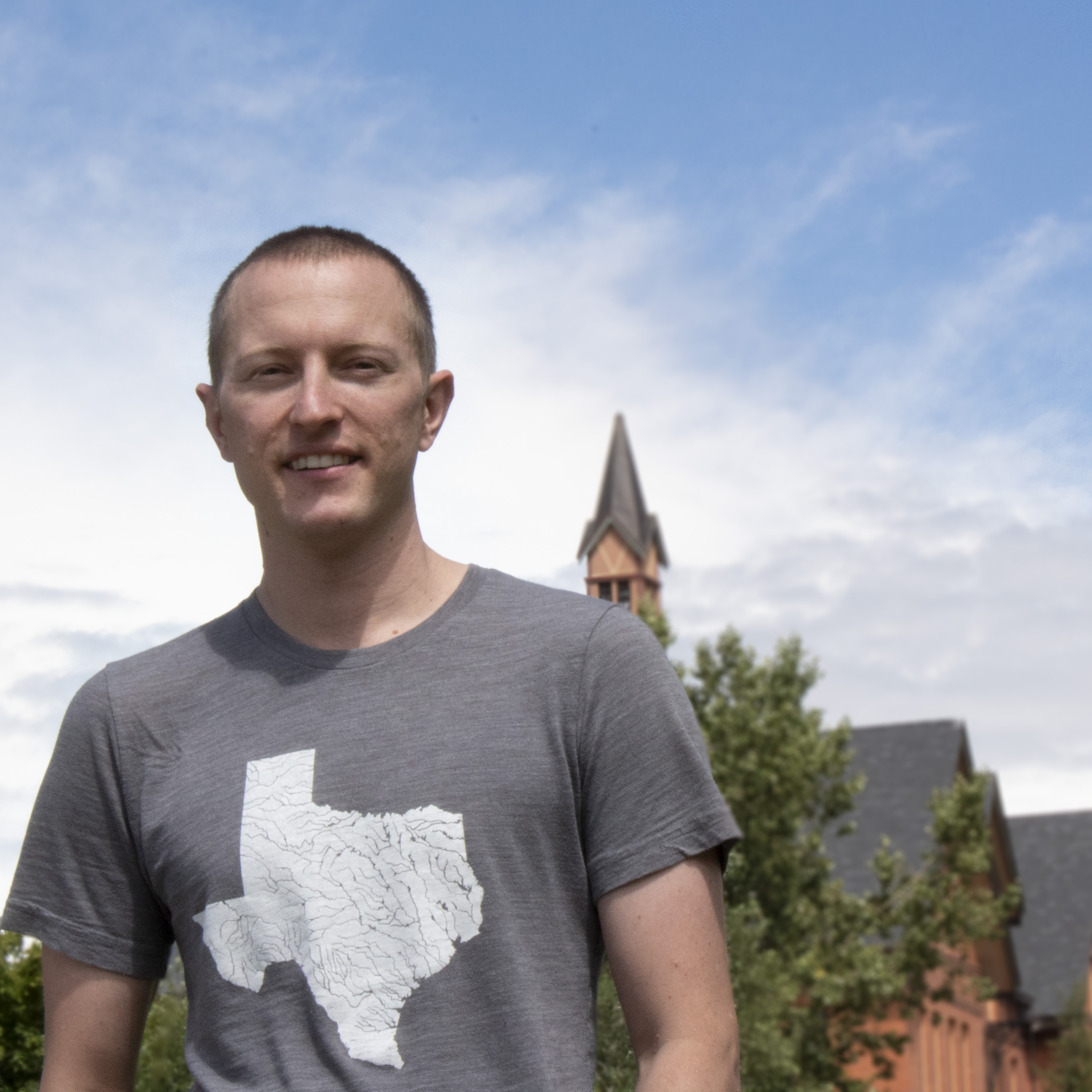 A picture of Trevor in front of montana hall