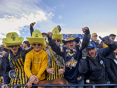 Students at an MSU football game