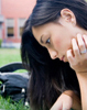 Woman focused laying on lawn