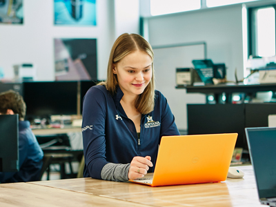 Student with a computer